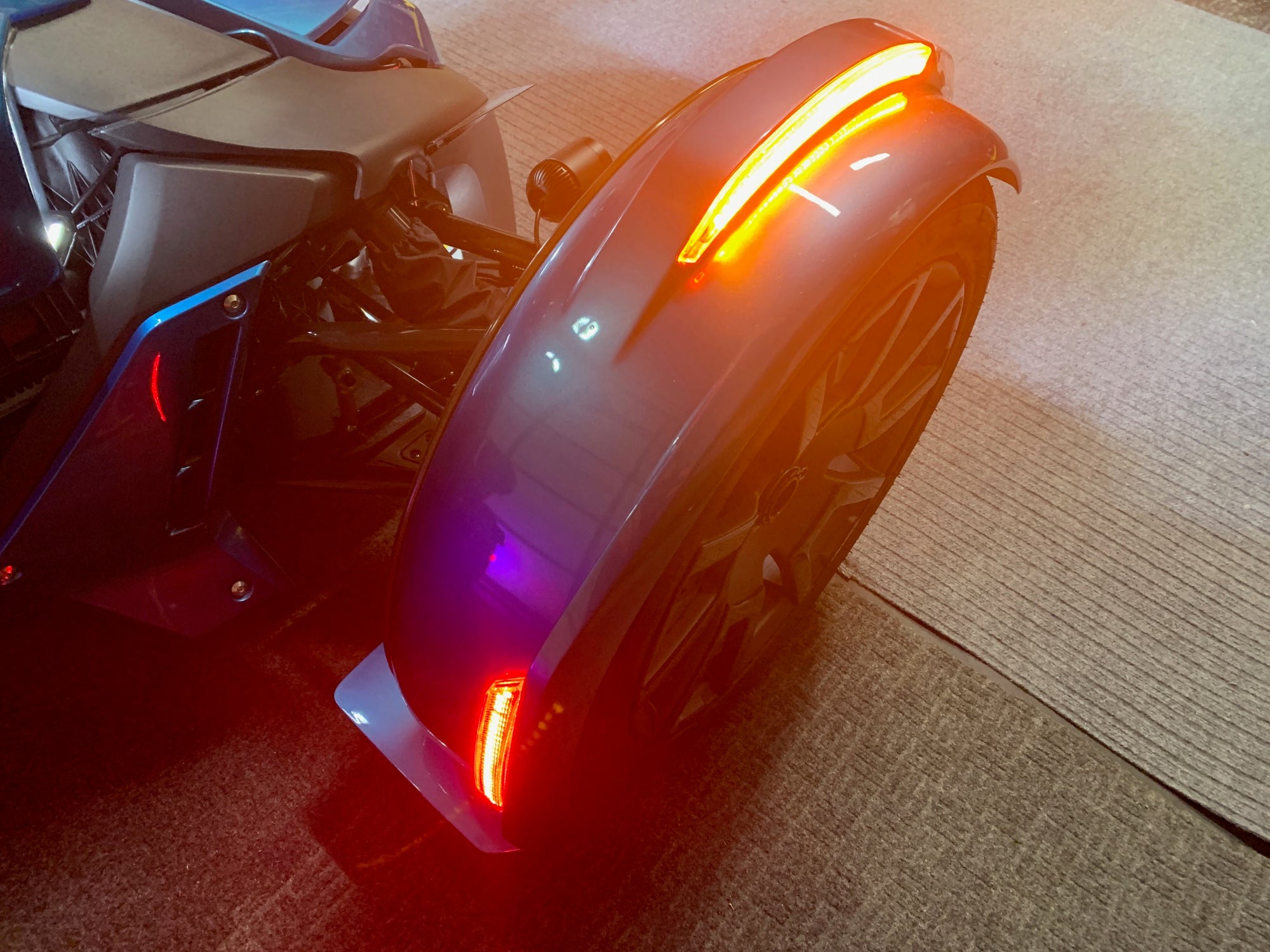 Amber and red LED for front fender with sequential turn signals